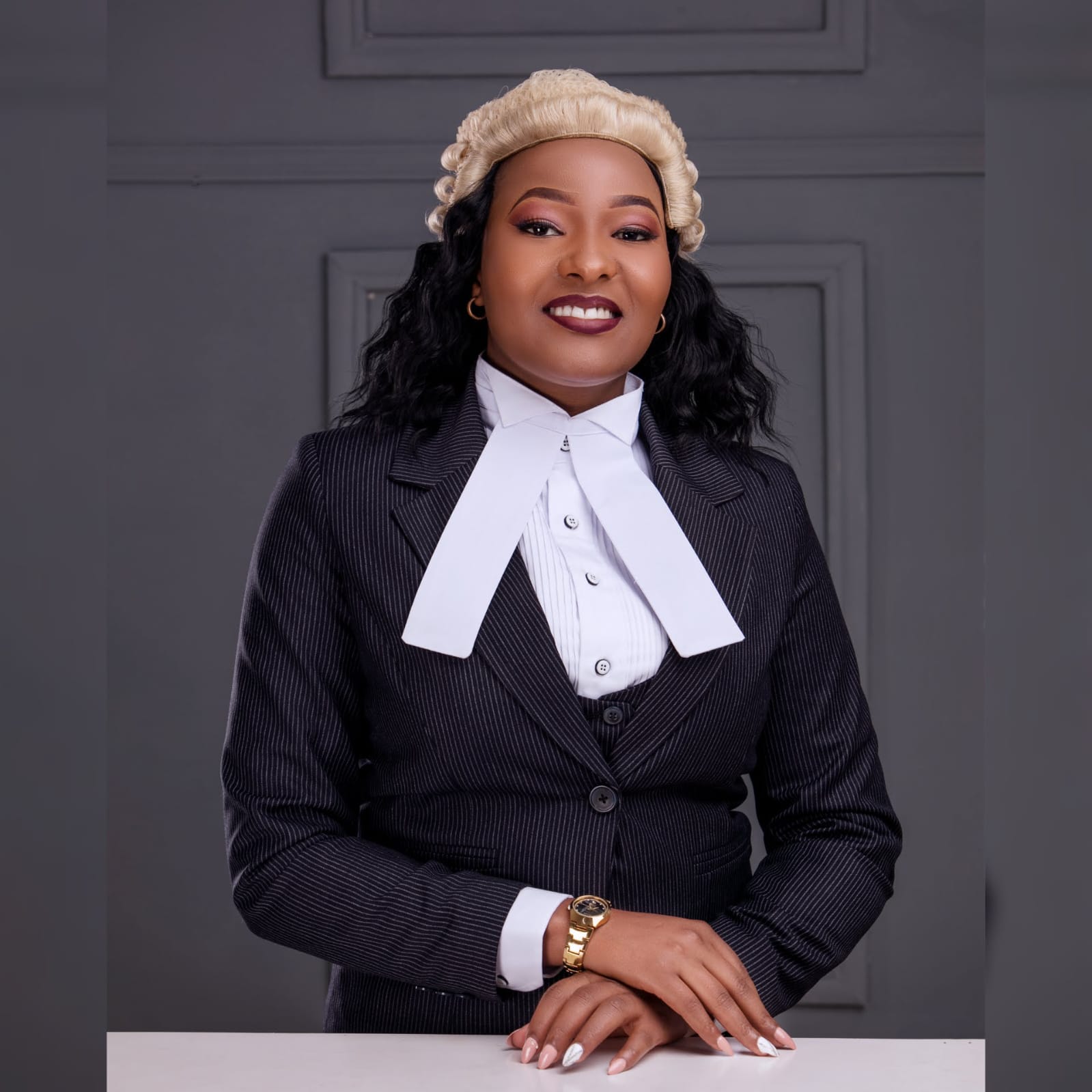 Phyllis Nduta seated in chambers